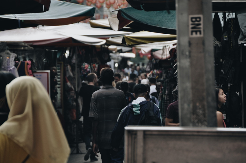 human, stalls, lifestyles, bus stop, clothing, pedestrian, person, market stall, outdoors, shop, street, crowd, apparel, business, walking, city life, suit