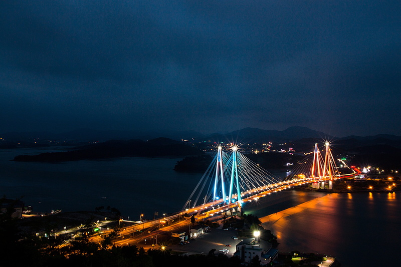 cloud - sky, skyscraper, modern, motion, nature, bridge - man made structure, beach, water, travel destinations, built structure, nightscape, architecture
