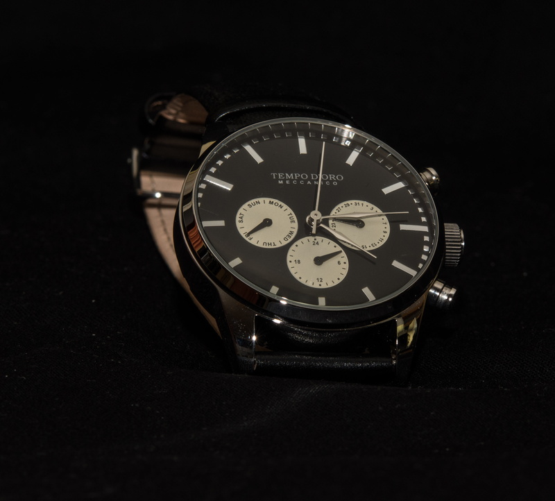 accuracy, black background, movement, still life, no people, wealth, automatic watch, time indicating, night, clock, high angle view, minute, close-up