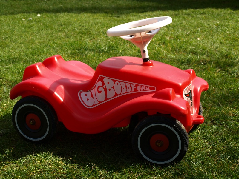 wheel, grass, land vehicle, childrens vehicles, park, lawn Mower, play outside, toy, green Color, bobby car, nature, movement, lawn, field, transportation