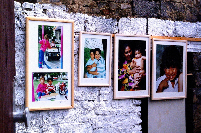 real people, people, architecture, wall - building feature, outdoors, retail, gypsies, human representation, built structure, glass - material, representation