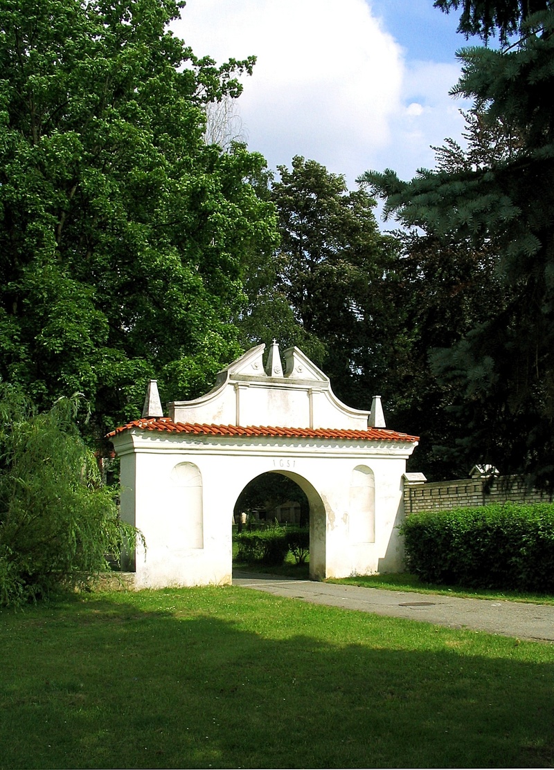 building exterior, portal, place of worship, day, tree, grass, park - man made space, sky, input, architecture, outdoors, arch, growth, green color, park