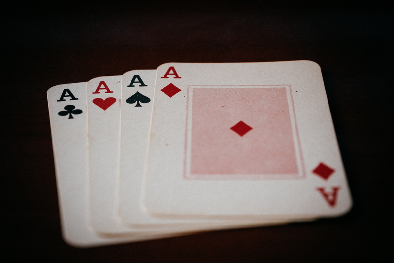 poker - card game, black background, photography, no people, still life, red, cards, table, leisure games, 5K, success, competition, relaxation, luck