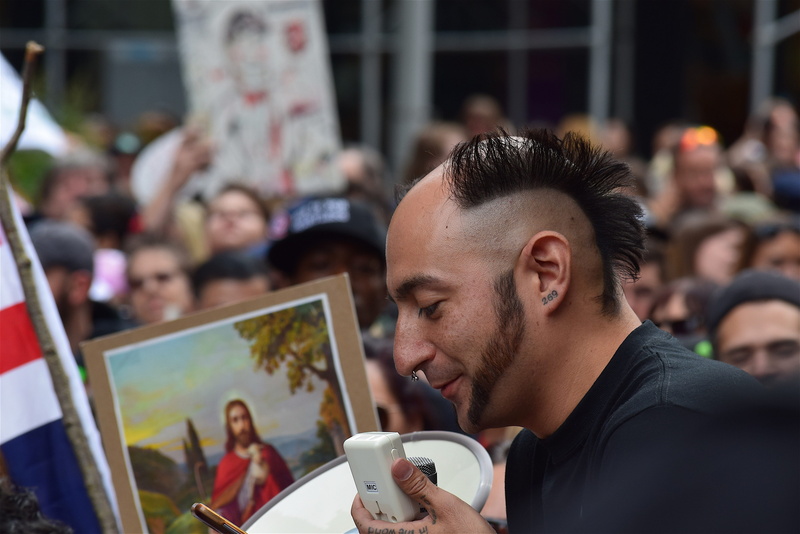 city, coffee cup, people, communication, activist, activism, incidental people, politics, coffee - drink, leisure activity, men, march, watching, headshot