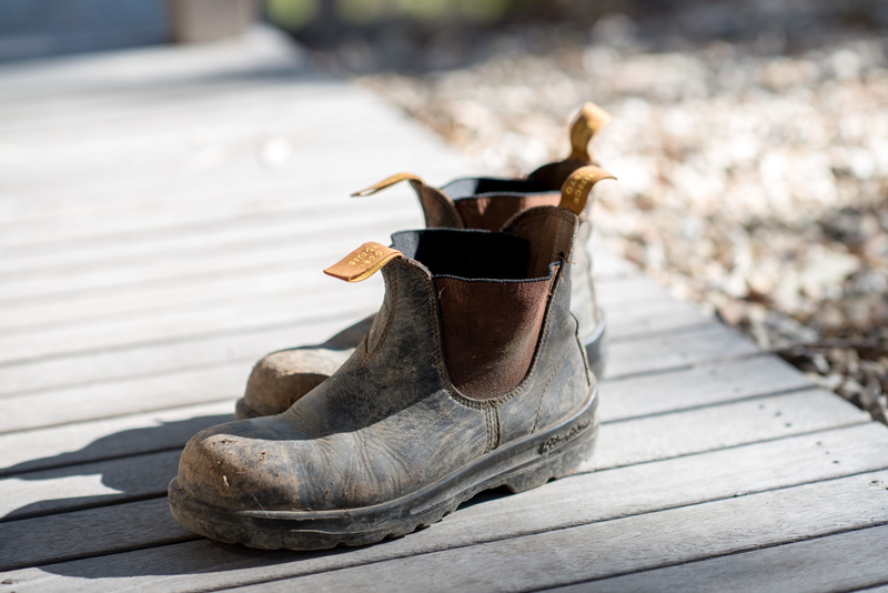 wood - material, personal accessory, boot, close-up, boardwalk, protection, focus on foreground, nature, absence, 5K, no people, day, old, outdoors, footwear