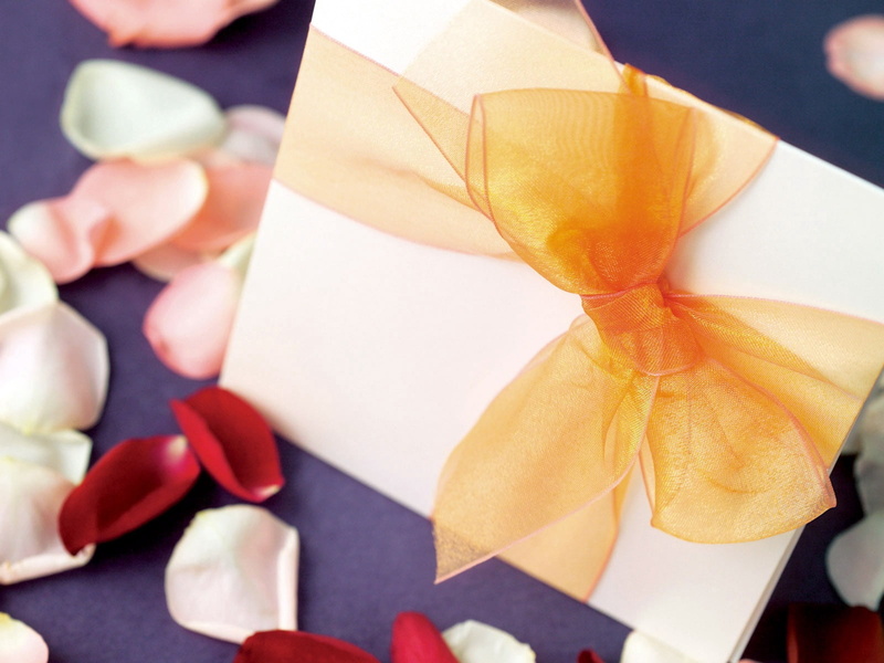 love, indoors, petals, one person, white, menswear, celebration, event, low section, hand, day, holding, human body part, ribbon, focus on foreground, body part