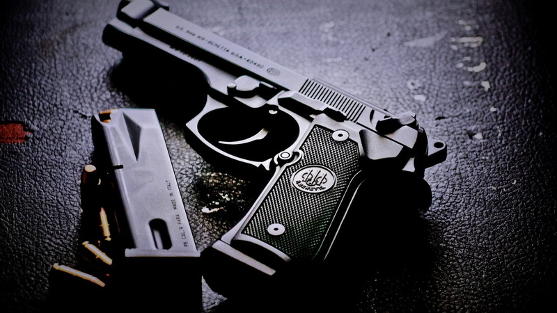 close-up, security, no people, single object, 720P, safety, high angle view, hat, technology, vignette, gun, metal, fashion, gun ammunition beretta m9