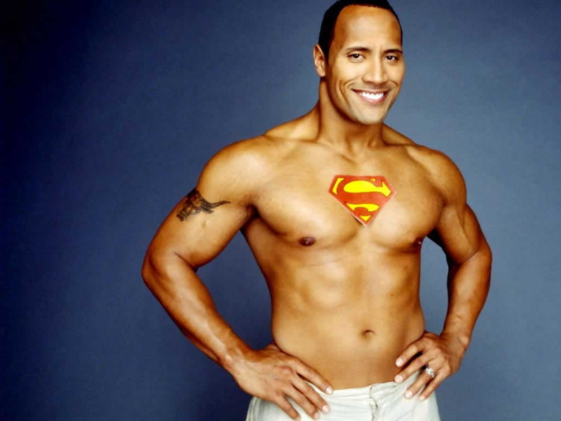 looking at camera, blue background, cheerful, chest, adult, shirtless, studio shot, human body part, one person, hand, young adult, teeth, emotion, rock