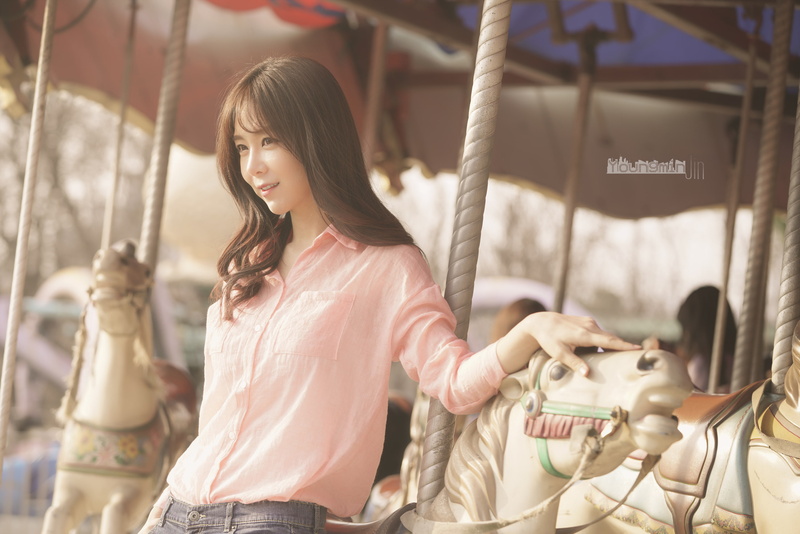 bangs, smiling, focus on foreground, real people, technology, hairstyle, three quarter length, 2K, waist up, Asian, women, leisure activity, child, holding