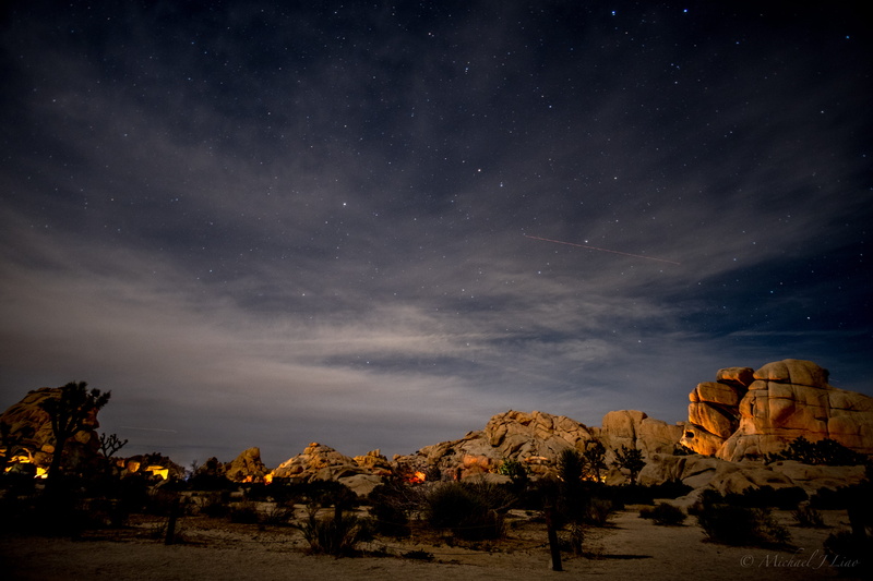 tranquil scene, rock, night sky, michael liao, sky, starry, outdoors, night, shooting star, galaxy, skies, environment, desert, formations, cloud - sky