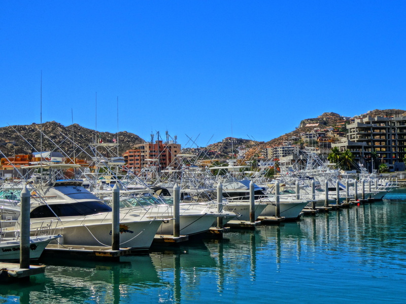 clear sky, marina, sea, 4K, cabo san lucas, day, harbor, waterfront, architecture, nautical vessel, blue, building exterior, outdoors, reflection, docked