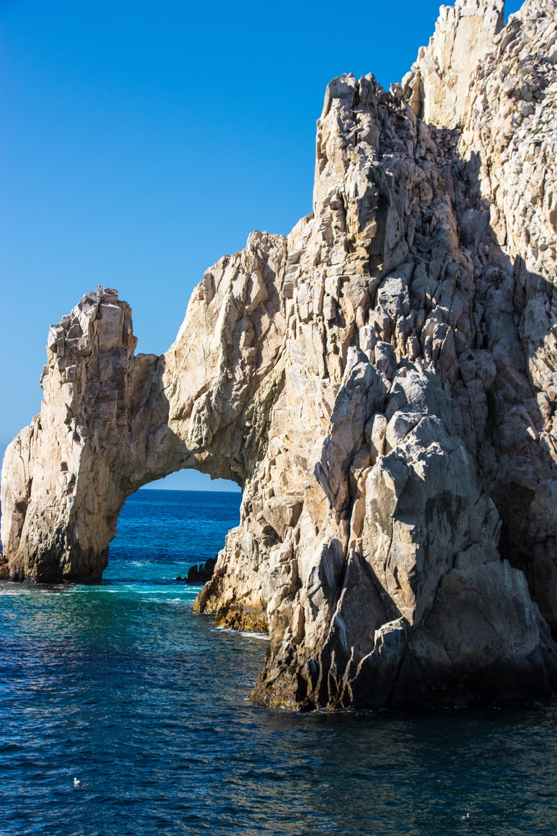 sky, Landmark, rocky coastline, water, waterfront, mediterranean Sea, Rock, Cabo San Lucas, landscape, land, outdoors, scenics, rock - Object, island, eroded