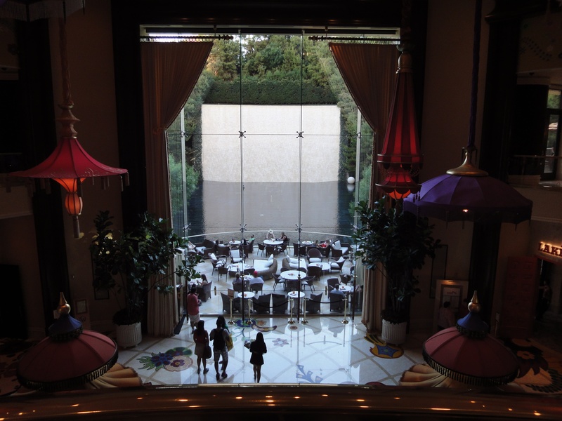luggage, luxurious, journey, wynn hotel, indoors, women, pamper, men, leisure activity, adult, resort, destination, sitting, crowd, built structure, illuminated