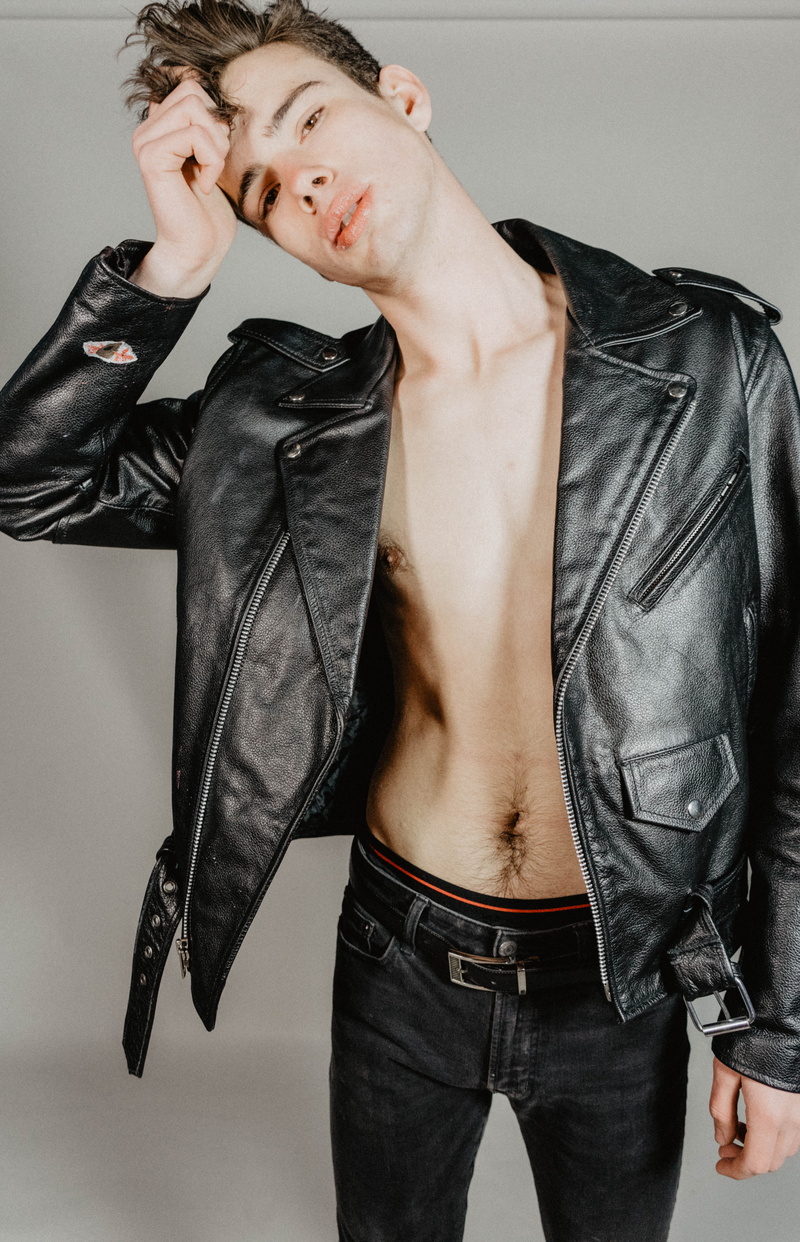 fully unbuttoned, one person, holding, fashion, leather, head, handsome, guy, man, hands in pockets, clothing, jacket, three quarter length, black, front view