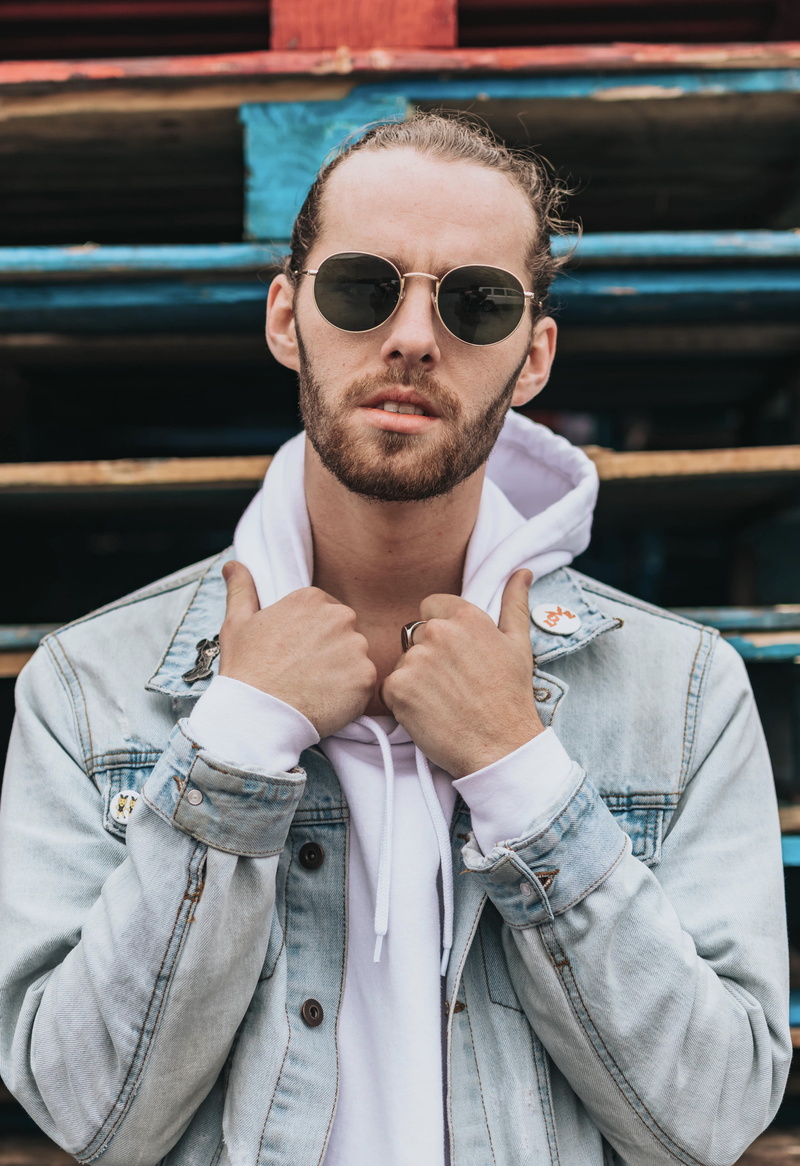 lifestyles, waist up, beard, young adult, leisure activity, blue, 5K, standing, real people, day, jacket, portrait, outdoors, denim, young men, fully unbuttoned