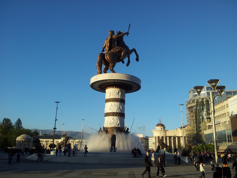architecture, art and craft, architectural column, human representation, sky, horse, clear sky, outdoors, group of people, skopje, statue, representation
