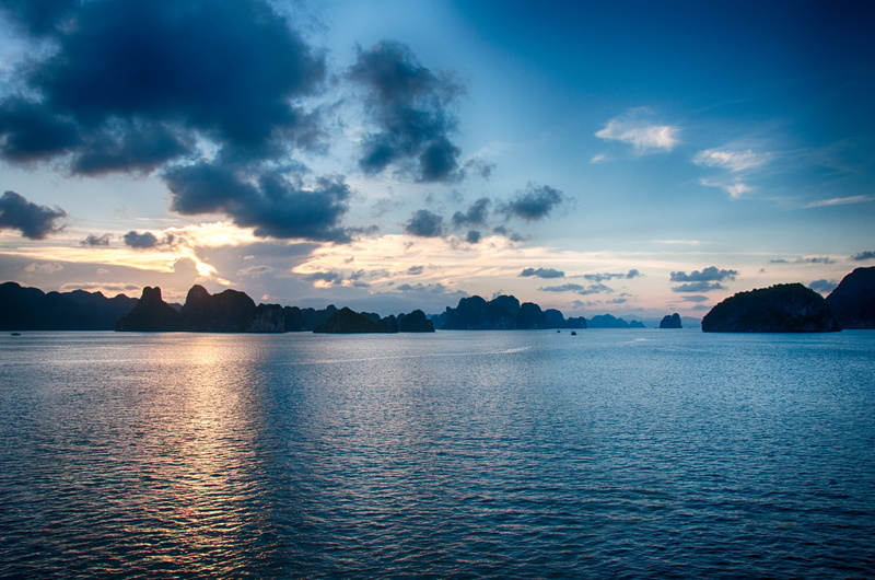 mountain, tranquil scene, mountains, sea, vietnam, islands, beauty in nature, halong bay vietnam, outdoors, tranquility, reflection, non-urban scene, water