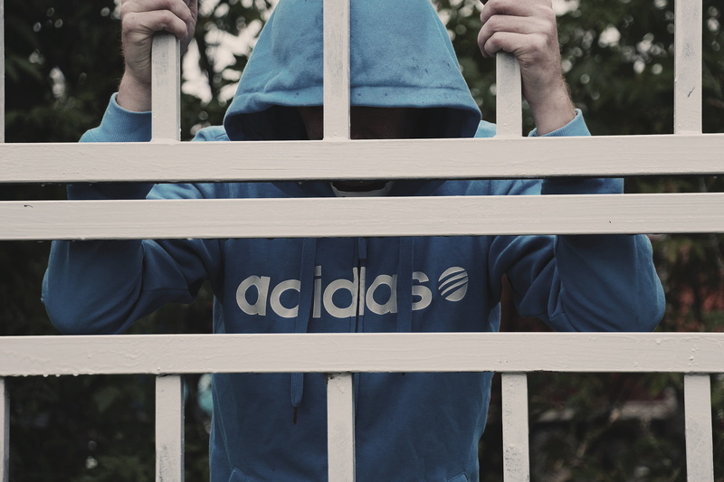 communication, western script, alcoholism, 5K, lifestyles, deadlock, railing, real people, life, shirt, bars, prison, text, addiction, person, outdoors