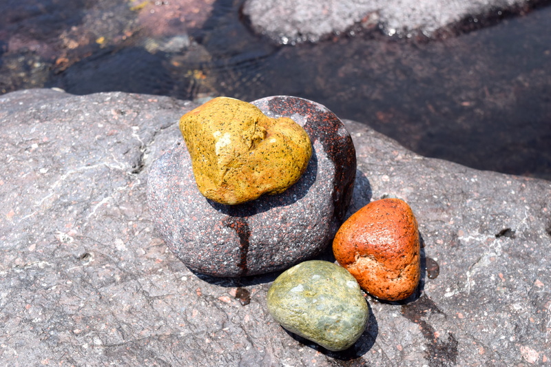 food and drink, nature, stone - object, no people, sunlight, rock - object, textured, river, shore stones, high angle view, outdoors, rough, waters, day
