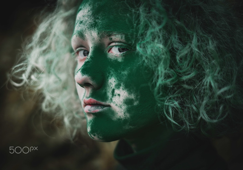 face paint, leisure activity, close-up, young adult, headshot, hair, contemplation, smoking - activity, one person, green color, smoke - physical structure