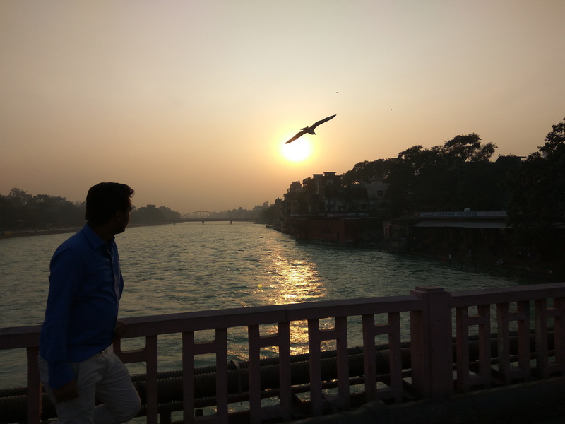 india, haridwar har ki pauri ghat, river, outdoors, standing, lifestyles, railing, scenics - nature, looking at view, water, one person, 4K, men, sunset