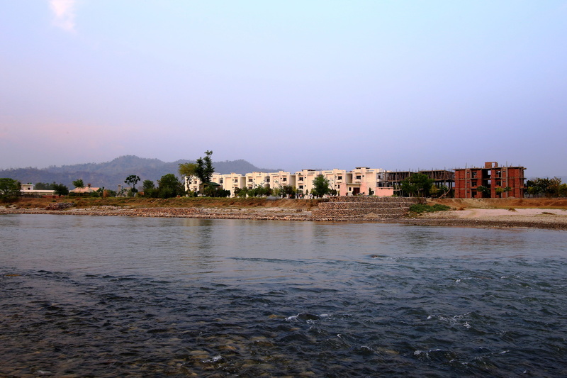 sea, outdoors, building, emerald riviera, no people, waterfront, city, nature, resort in haridwar, tree, travel destinations, beauty in nature, scenics - nature