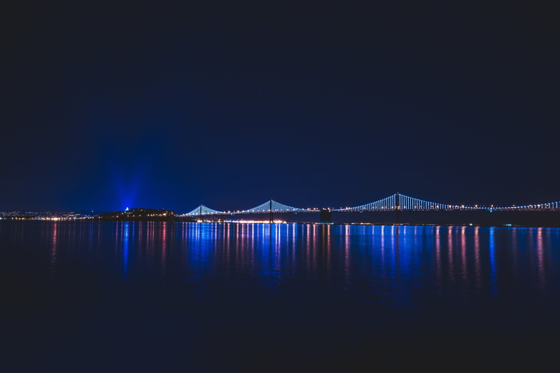 sea, nighttime, illuminated, gray, reflection, lighted, bay, architecture, wide, suspension, scenics - nature, city, water, outdoors, beauty in nature