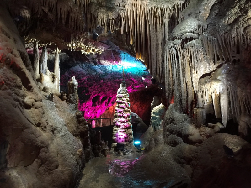 underground, illuminated, pattern, indoors, nature, cave, ceiling, solid, flow, stalagmites, night, beauty in nature, inside, natural calcium deposits