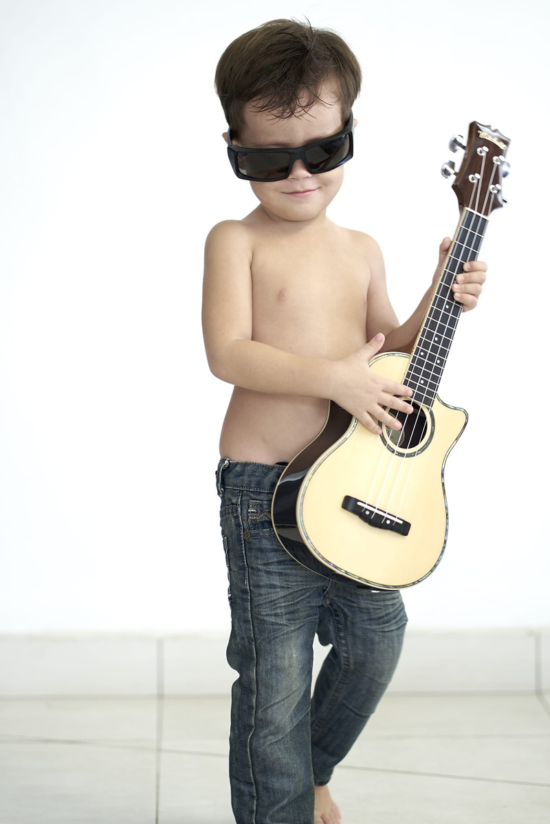 music, one person, playing, childhood, boy, musical instrument, rock music, standing, musical equipment, casual clothing, tahiti, guitar, french polynesia