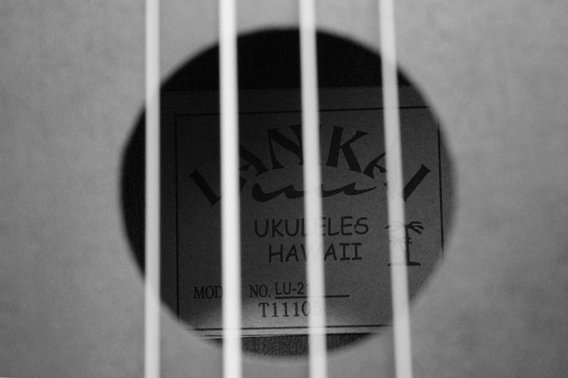 shape, shadow, single object, guidance, indoors, sign, kalani, healthcare and medicine, studio shot, text, communication, close-up, ukulele, geometric shape