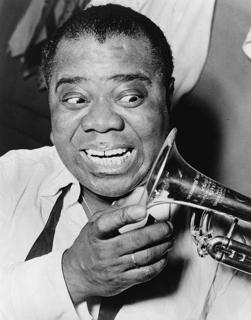 wind, indoors, jazz, stage, males, instrument, adult, holding, louis armstrong, new orleans, jazz trumpeter, tv, entertainer, men, close-up, looking at camera