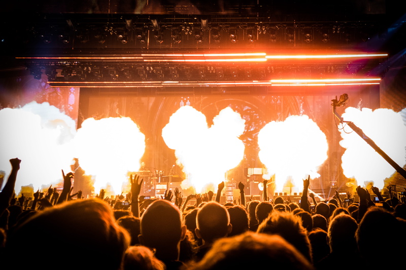 performing arts event, stage light, crowd, stadium, public, fire, explosive, popular music concert, stage - performance space, music, gig, arts culture and entertainment