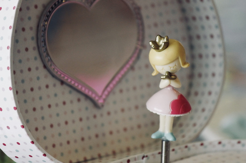 two objects, yellow, pink color, dancer, little, cup, box, celebration, music box, antique, retro styled, focus on foreground, indoors, love, girly, pink