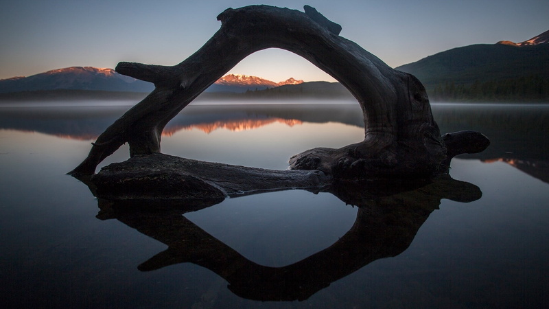 non-urban scene, calm, sunrise, pyramid lake, mist, waterfront, sky, tranquility, lake, jasper, national park, outdoors, arch, water, alberta, scenics - nature