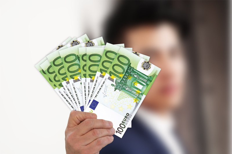paper currency, businessman, focus on foreground, making money, suit, person, wealth, one person, leisure activity, human hand, luxury, euro, investment