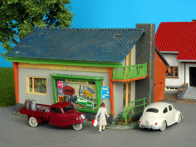 day, model train, mom-and-pop store, outdoors, architecture, 50s, goliath, sky, residential district, transportation, retail business, car, road, diorama