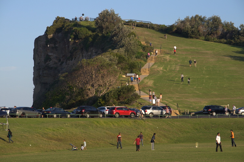 leisure activity, women, central coast, land, cricket, coastal, men, green color, large group of people, transportation, adult, crowd, lifestyles, built structure