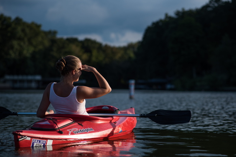 one person, leisure activity, adult, body, river, water, day, paddle, lifestyles, rowing, sport, woman, waist up, mode of transportation, hairstyle, adventure