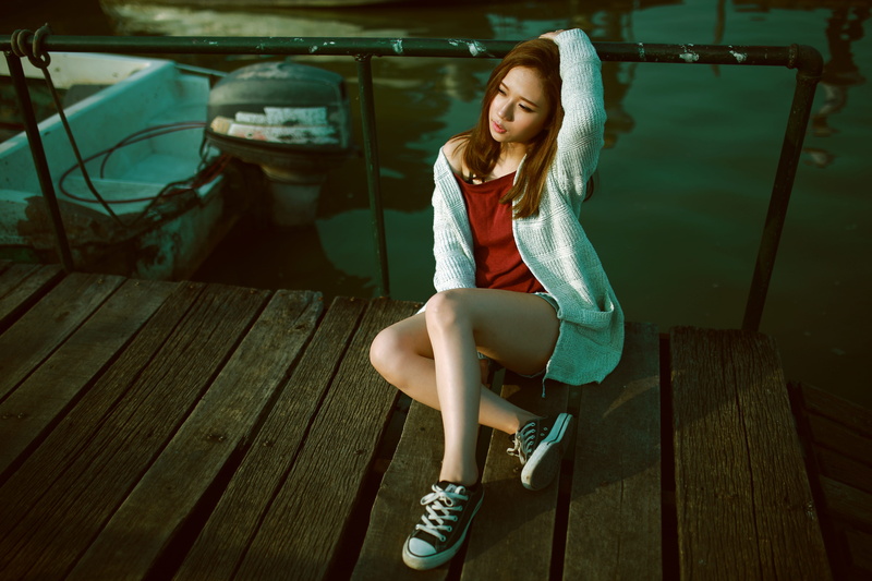 asian, shoes, lifestyles, holding, 5K, one person, trainer, beauty, cardigan, full length, leisure activity, jetty, teenager, leg, portrait, young adult