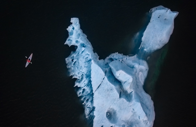 solid, canoes, white color, water, snow, environment, glacier, black background, iceberg, aerial view, cold temperature, outdoors, tranquility, nature