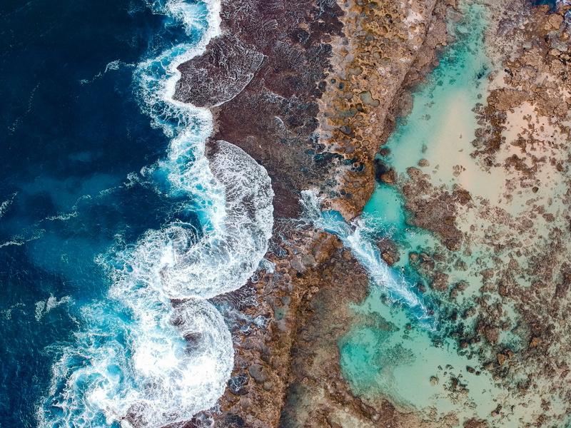 land, view from above, power in nature, blue, outdoors, sea, ocean, design, close-up, day, backgrounds, swimming pool, high angle view, full frame, no people