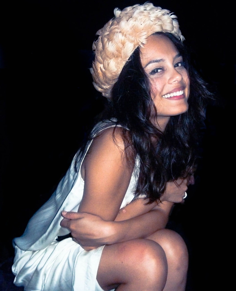 Nathalie Kelley , actress, hairstyle, adult, fashion, smiling, hair, emotion, black background, studio shot, wavy hair, dark, model, beautiful woman, looking at camera
