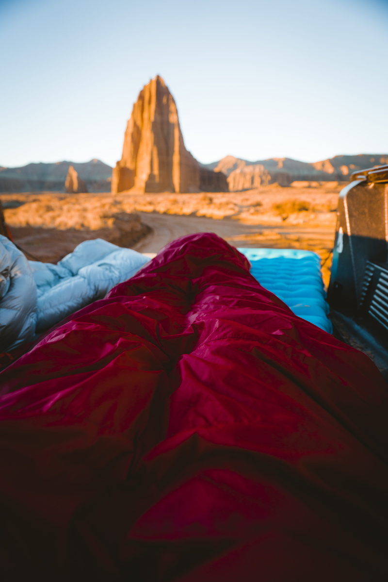 bag, overlooking, camping, formations, bed, person, solid, capitol reef, furniture, water, sleeping, red, tranquil scene, trail, environment, velvet, nature
