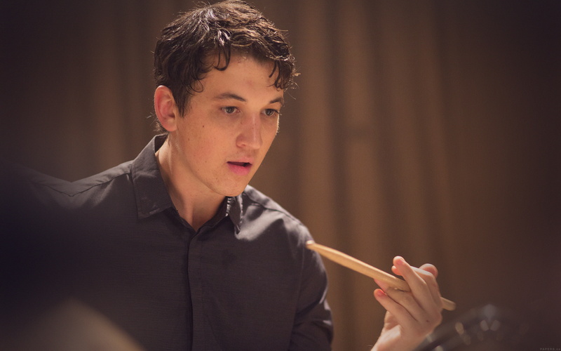 teller, one person, miles, holding, teenager, arts culture and entertainment, indoors, concentration, men, close-up, performance, serious, drum, portrait