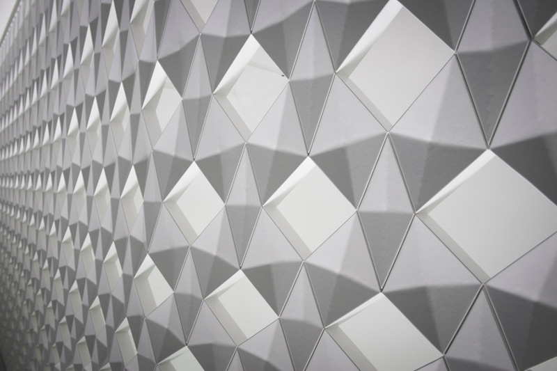 full frame, triangle shape, glass - material, ceiling, indoors, no people, shape, art, geometric shape, built structure, gray, pattern, close-up, wall