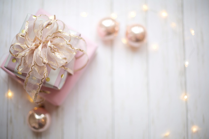 indoors, human body part, pink, present, beauty in nature, luxury, people, jewelry, text space, gift, close-up, sparkle, fashion, pearl jewelry, christmas