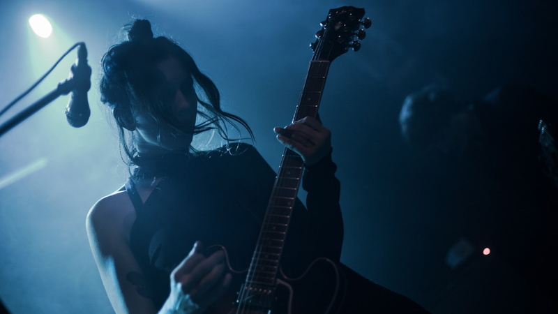 stage - performance space, musician, nightlife, holding, Chelsea Wolfe, stage light, microphone, performance, popular music concert, plucking an instrument