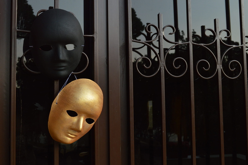 fake, 2K, outdoors, retail display, male likeness, day, masks, store, black door, mannequin, art and craft, metal, transparent, retail, close-up, lebanon
