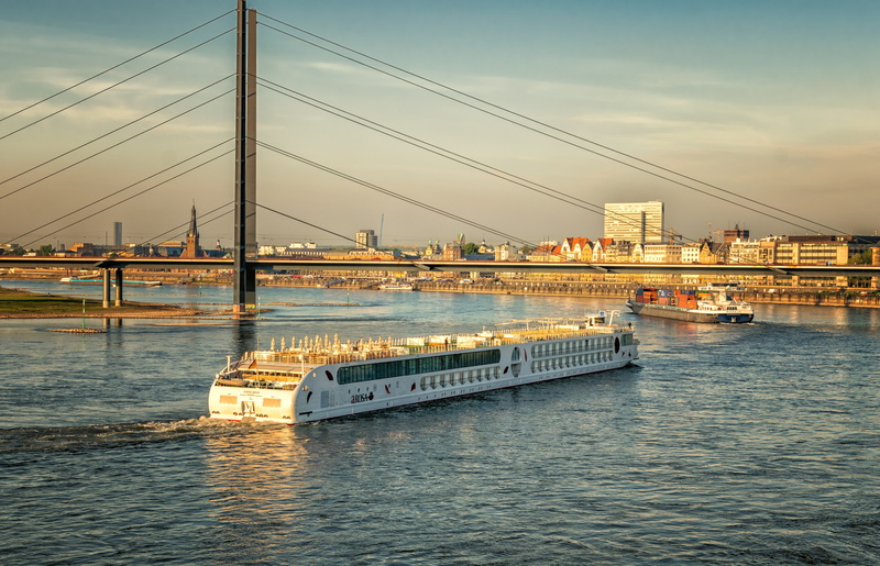 crew, 5K, north rhine westphalia, city, mode of transportation, built structure, sun, travel destinations, skyline, suspension bridge, golden, river, waterfront