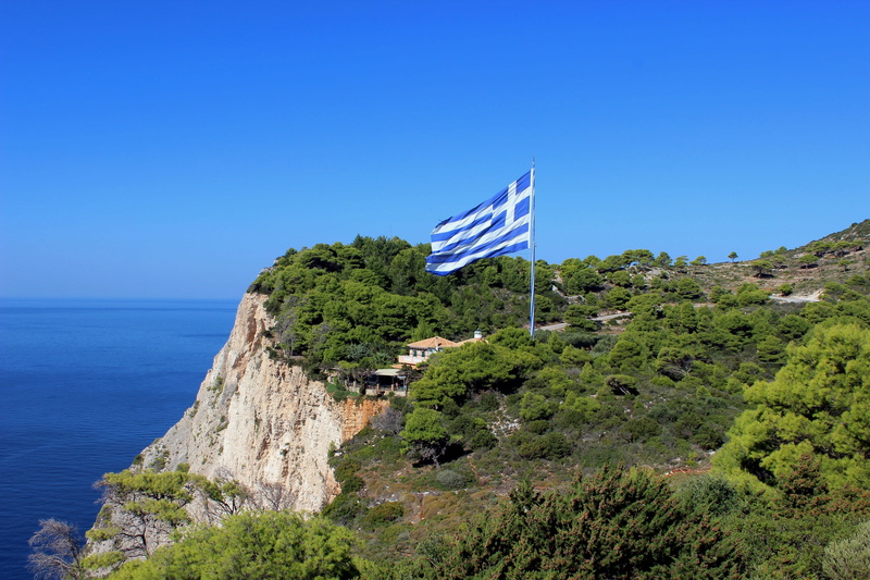 scenics - nature, Sea, tranquil scene, plant, Zakynthos, beauty in nature, mountain, flag, no people, cliff, blue, outdoors, scenic, national icon, Landscape